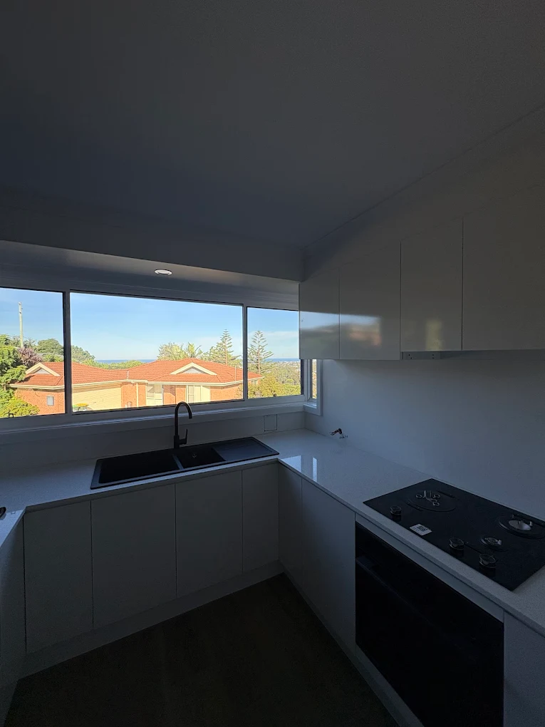 Kitchen plumbing with ocean view
